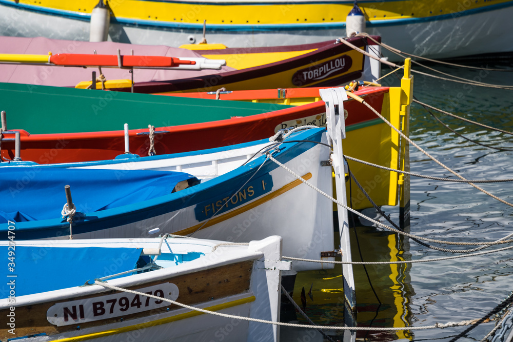 Nice, France - April 2017: colouful wooden dingys in the harbour ar Nice