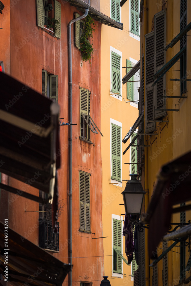 Nice, France - April 2017: a narrow and alleyway in Nice's Old City