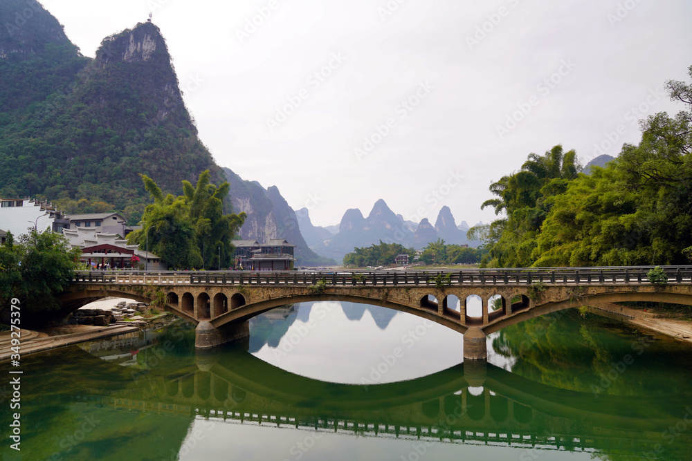 Fototapeta premium river bridge in Xingping Fishing Village, Yangshuo County