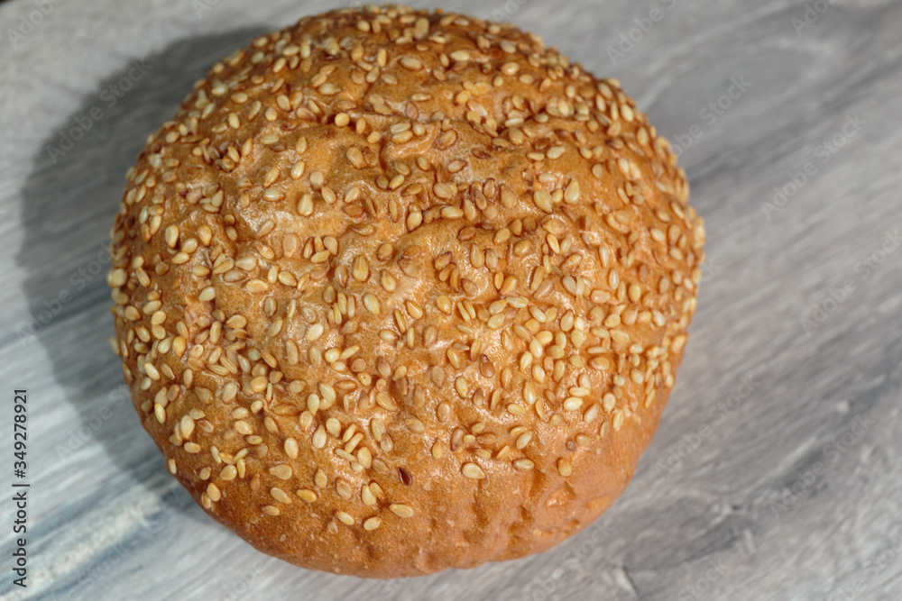 Hamburger bun with sesame seeds. Hamburger bun with sesame seeds.