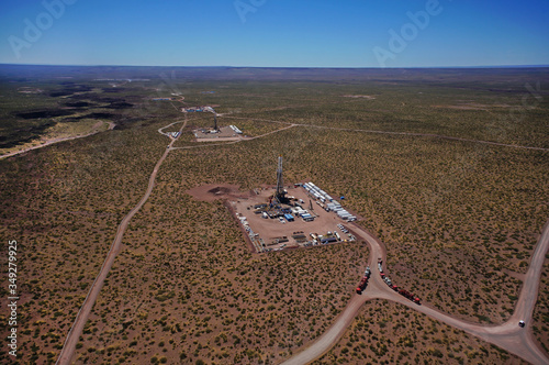 image of hydraulic fracturing unit with blue sky