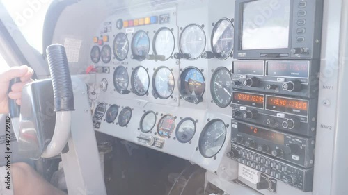 Inside cockpit of small airplane photo