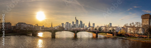 setting sun in the early spring over the frankfurt skyline