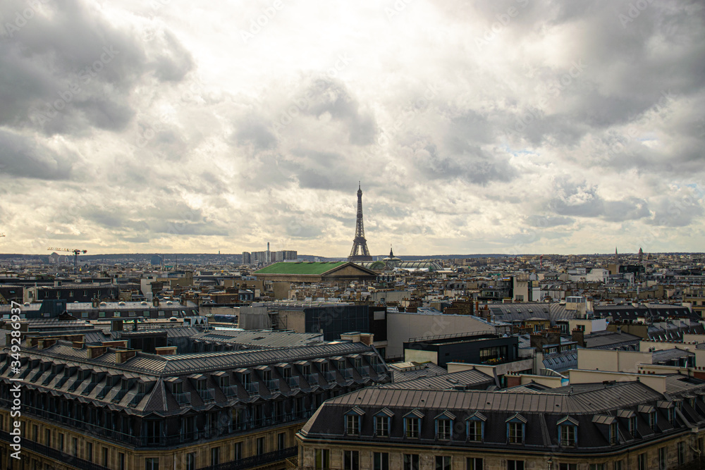 Photo of the Paris skyline in France during a cloudy day