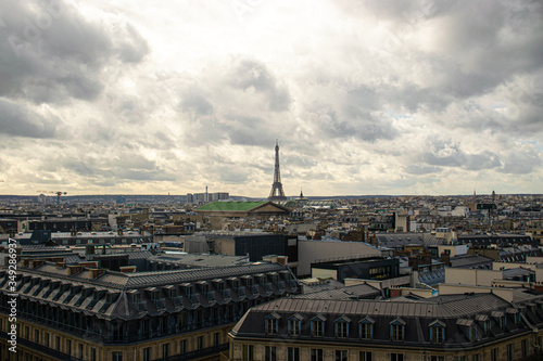 Photo of the Paris skyline in France during a cloudy day © Irene Castro Moreno