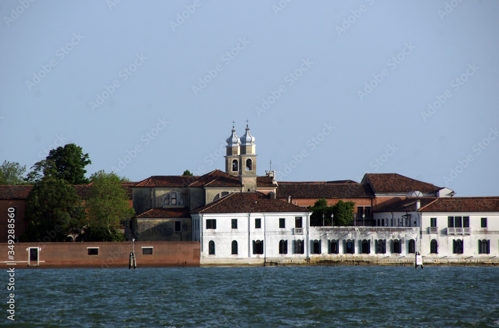 Photo with the view from Castello district in Venice with church and facades.