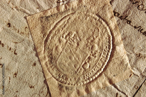 Dry seal with the Poraj coat of arms on a document from AD 1670. Sucha pieczęć z herbem Poraj (jedna z wielu odmian tego herbu) na dokumencie z 1670 roku.
