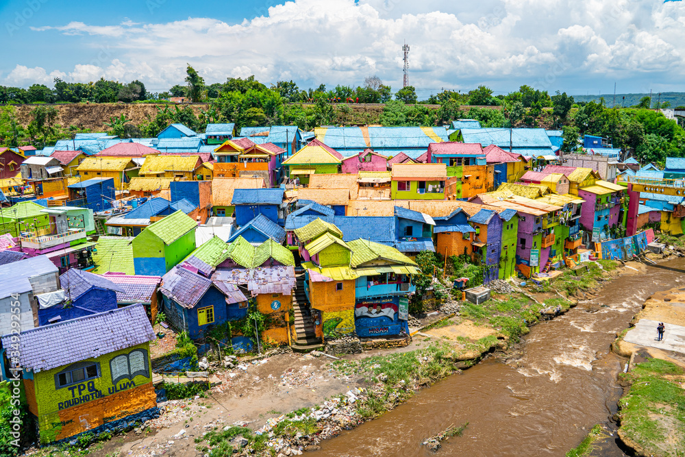 Fototapeta premium the colourful rainbow village also know as Kampung Warna Warni. amazing colours everywhere where the locals live in Malang, Java, Indonesia