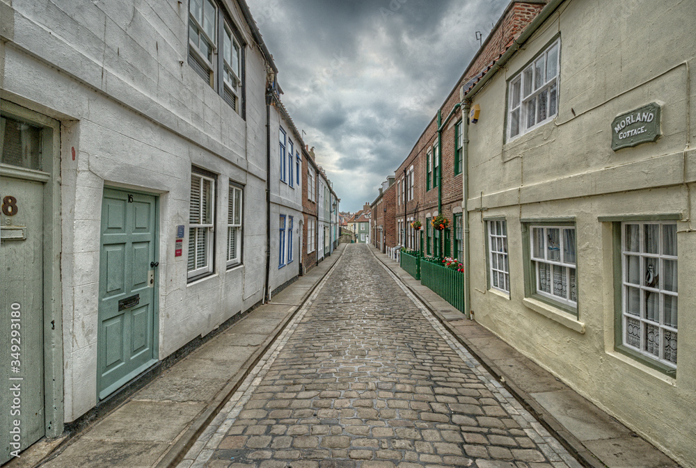 Houses & holiday cottages, Henrietta Street, Whitby. In Whitby, North Yorkshire, England. 