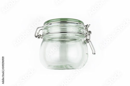  Closed glass jar with a metal latch, isolated on white background with clipping path. 