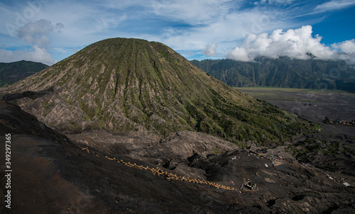 the surrounding area of Mount Bromo with a cloudy and mystic mood early in the morning on Java in Indonesia