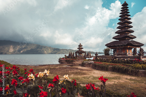 Pura Ulun Danu Bratan temple near Beratan lake in Bali island, Indonesia. Iconic image of Bali and southeast Asia. Travel and adventure background and postcard image. photo