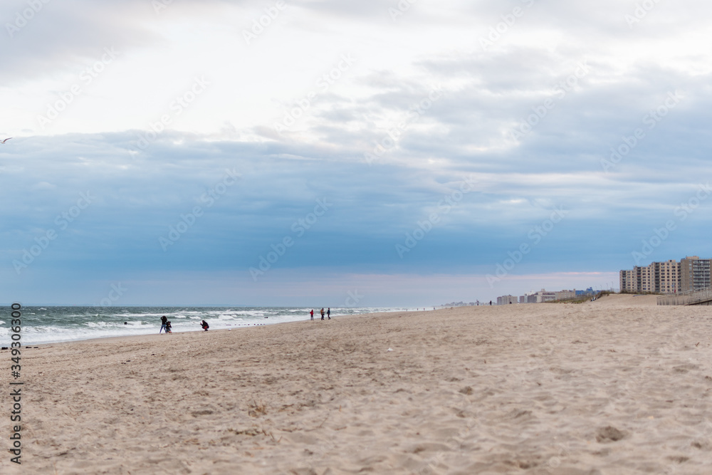 Empty Rockaway Beach at sunset in Queens, New York City in May 2020