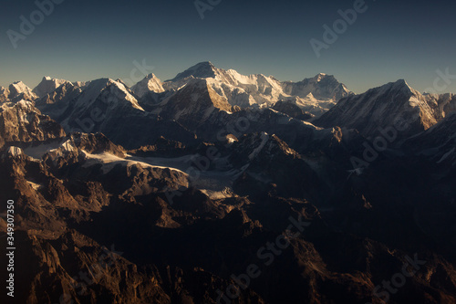 Beautiful landscape with Everest Peak in background at sunrise, view from above. Himalaya Mountains, Nepal © danmir12