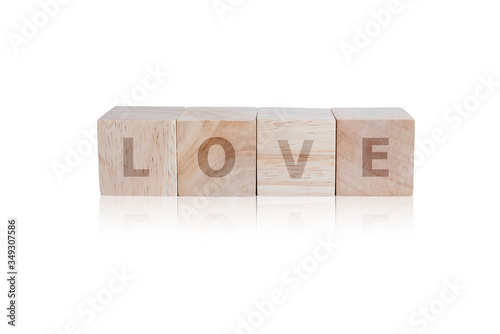 Wooden cubes with beautiful abstract textured and "LOVE" text on them isolated on white background