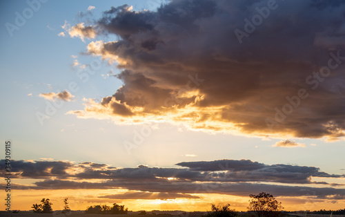 Dusk with sun and clouds on an agricultural production farm in the south of Brazil