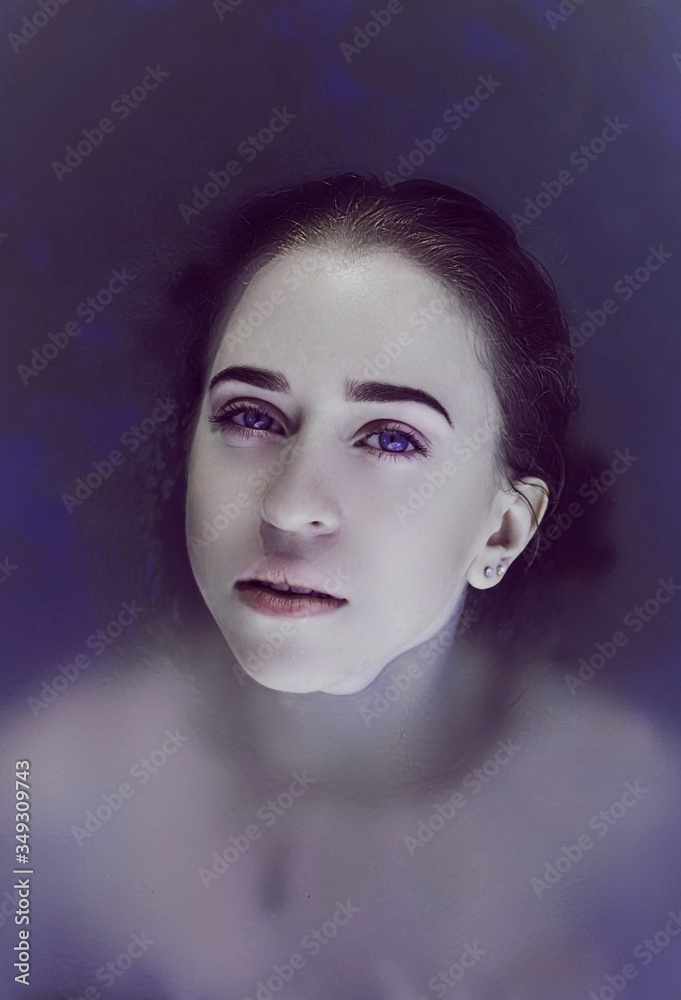 Lovely girl in blue water. Snow-white skin Lovely girl in blue water. Snow-white skin