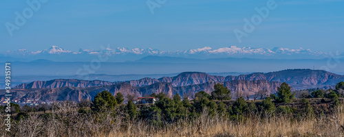 view of the snowy mountains on a clear blue day