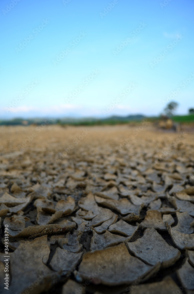 Fototapeta premium The soil broke after flooding in the evening.