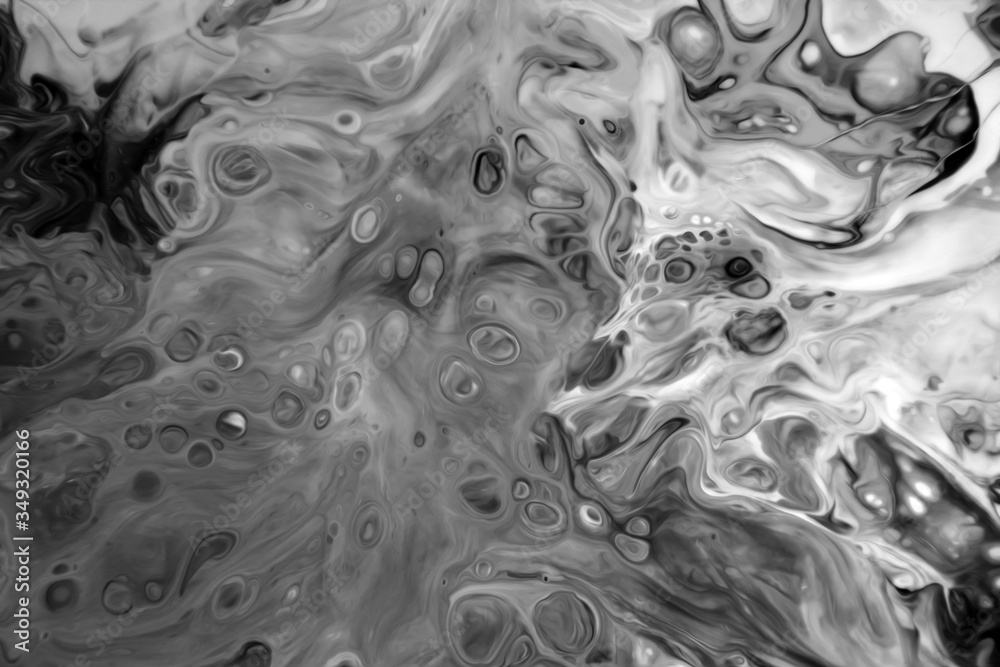 Abstract black and white background of mixed colors. The spread of