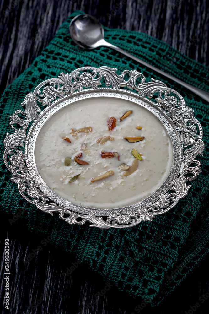 Φωτογραφία Kheer or Payasam is a type of rice pudding from the Indian subcontinent, made by boiling milk and sugar and is flavoured with dry fruits and nuts, served in decorative plate