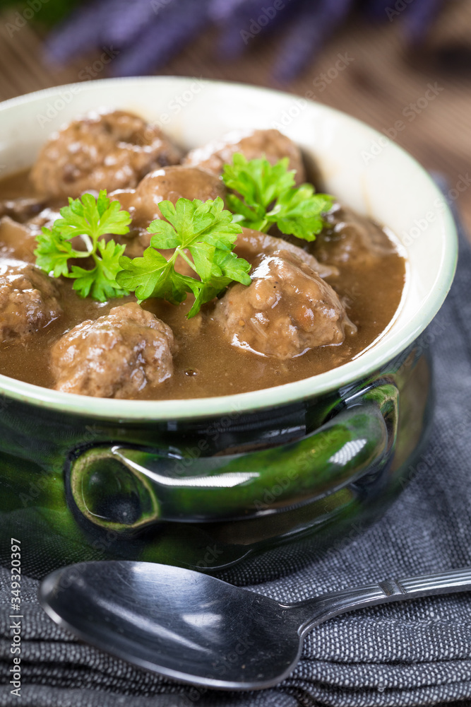 Pork meatballs with noodles in a green bowl. Pork meatballs with noodles in a green bowl.