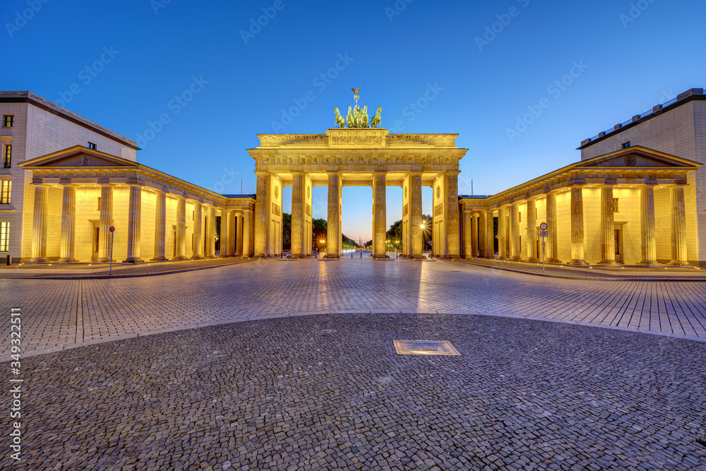 The illuminated Brandenburg Gate in Berlin after sunset with no people The illuminated Brandenburg Gate in Berlin after sunset with no people