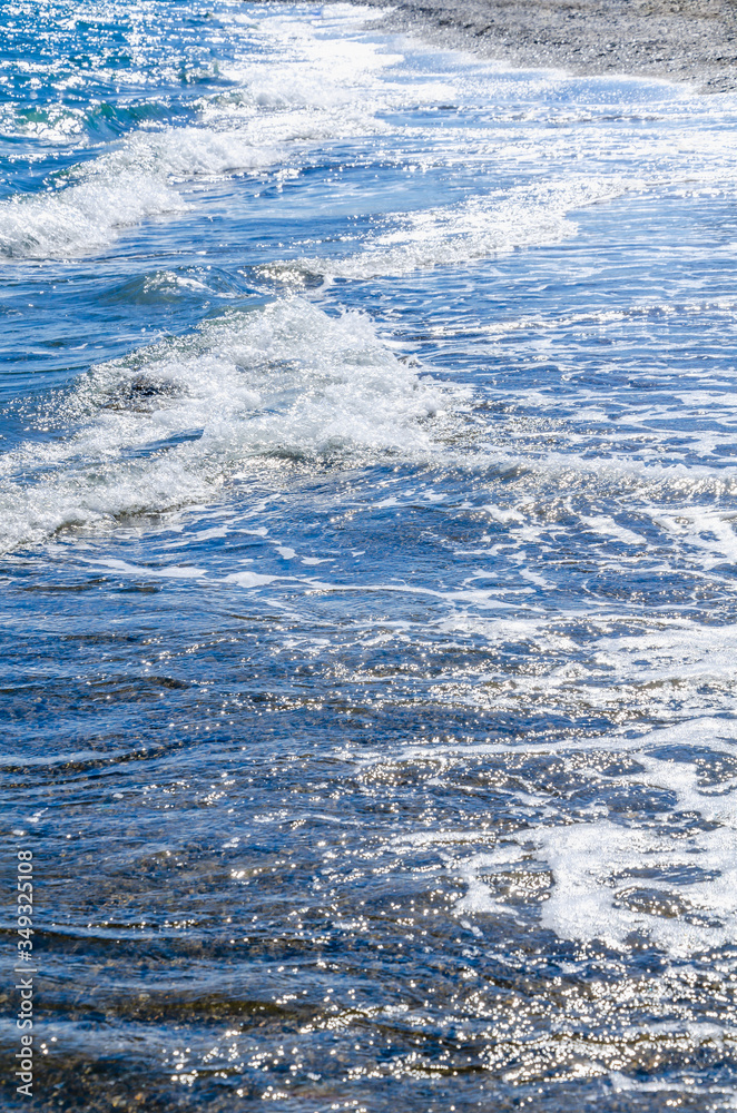 Fototapeta premium Seascape background white waves on coast