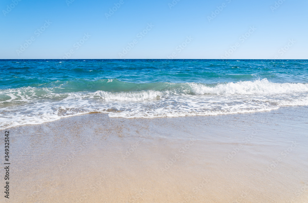 Seascape background colorful sea waves on sandy beach