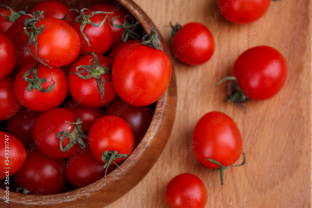 tomatoes on a wooden board tomatoes on a wooden board