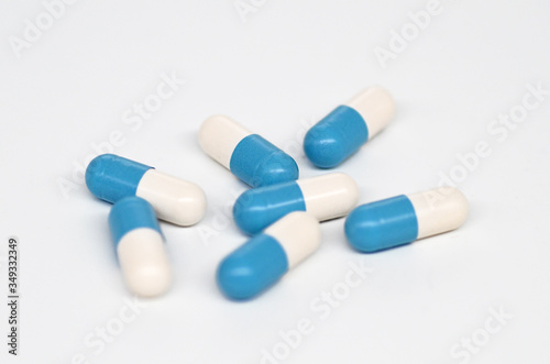 capsule medicine pills on white.