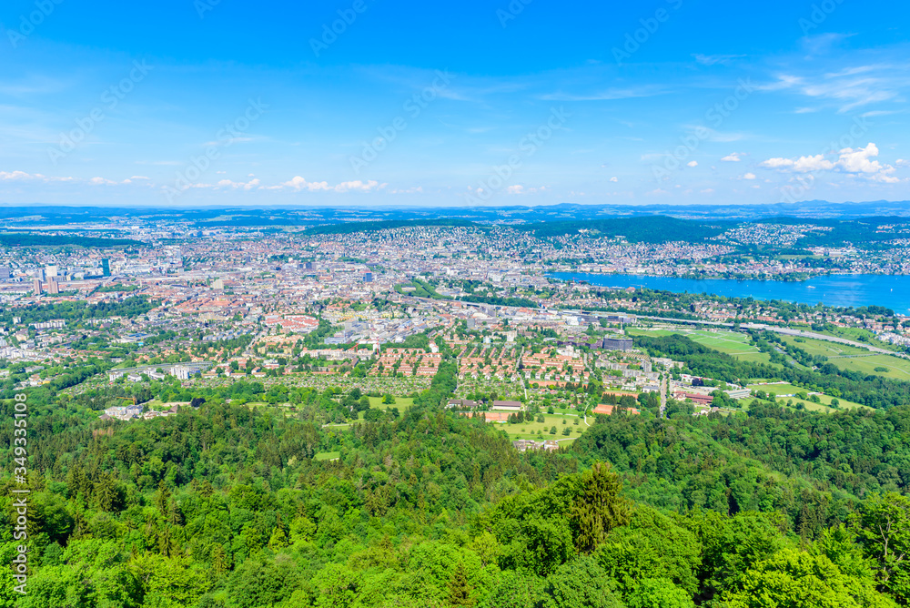 Panoramic view of Zurich lake and Alps from the top of Uetliberg mountain, from the observation platform on tower on Mt. Uetliberg, Switzerland, Europe