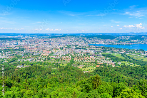 Panoramic view of Zurich lake and Alps from the top of Uetliberg mountain, from the observation platform on tower on Mt. Uetliberg, Switzerland, Europe © Simon Dannhauer