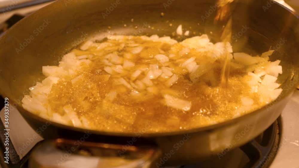 Onions with Sugar cooking in a pan Onions with Sugar cooking in a pan