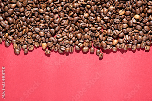 Coffee beans on a red background