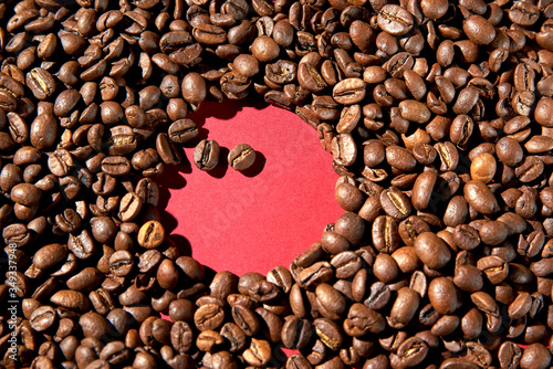 Coffee beans on a red background