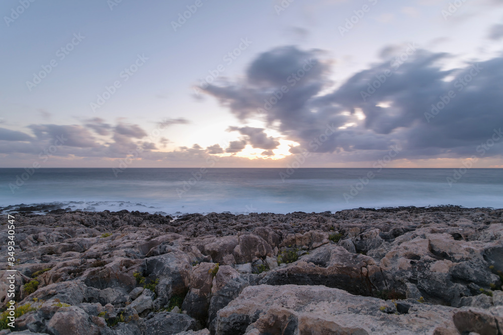 Sunset on a rocky beach