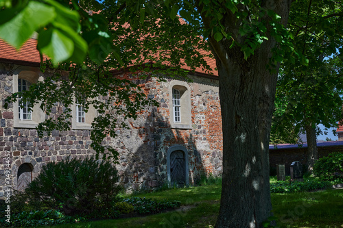 Side view of a medieval village church in the state of Brandenburg, Germany.