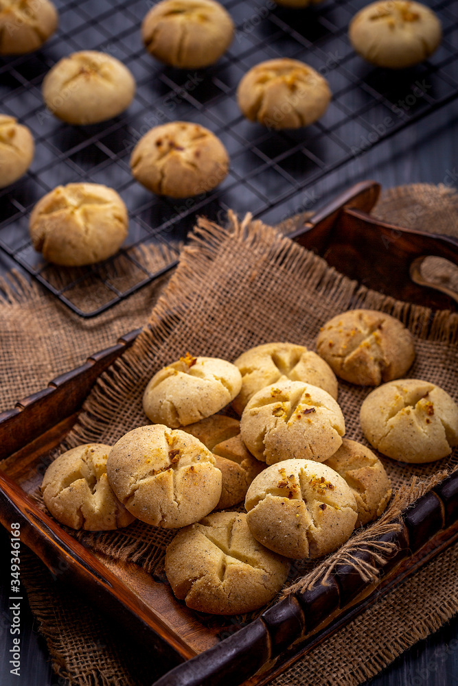 Freshly baked nankhatai are on a tray, Nankhatai are shortbread biscuits, originating from the Indian subcontinent, popular in Northern India and Pakistan. Freshly baked nankhatai are on a tray, Nankhatai are shortbread biscuits, originating from the Indian subcontinent, popular in Northern India and Pakistan.