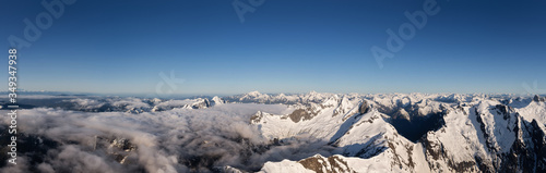 Aerial Panoramic View of Remote Canadian Mountain Landscape during sunny morning. Located near Vancouver, British Columbia, Canada. Nature Panorama Background. Authentic © edb3_16