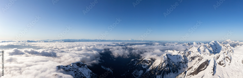 Aerial Panoramic View of Remote Canadian Mountain Landscape during sunny morning. Located near Vancouver, British Columbia, Canada. Nature Panorama Background. Authentic