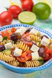 Cheese salad with pasta and fresh vegetables
