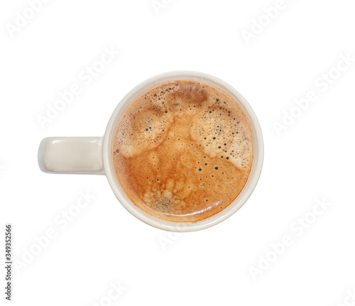 top view of a mug of freshly brewed aromatic coffee isolated on white