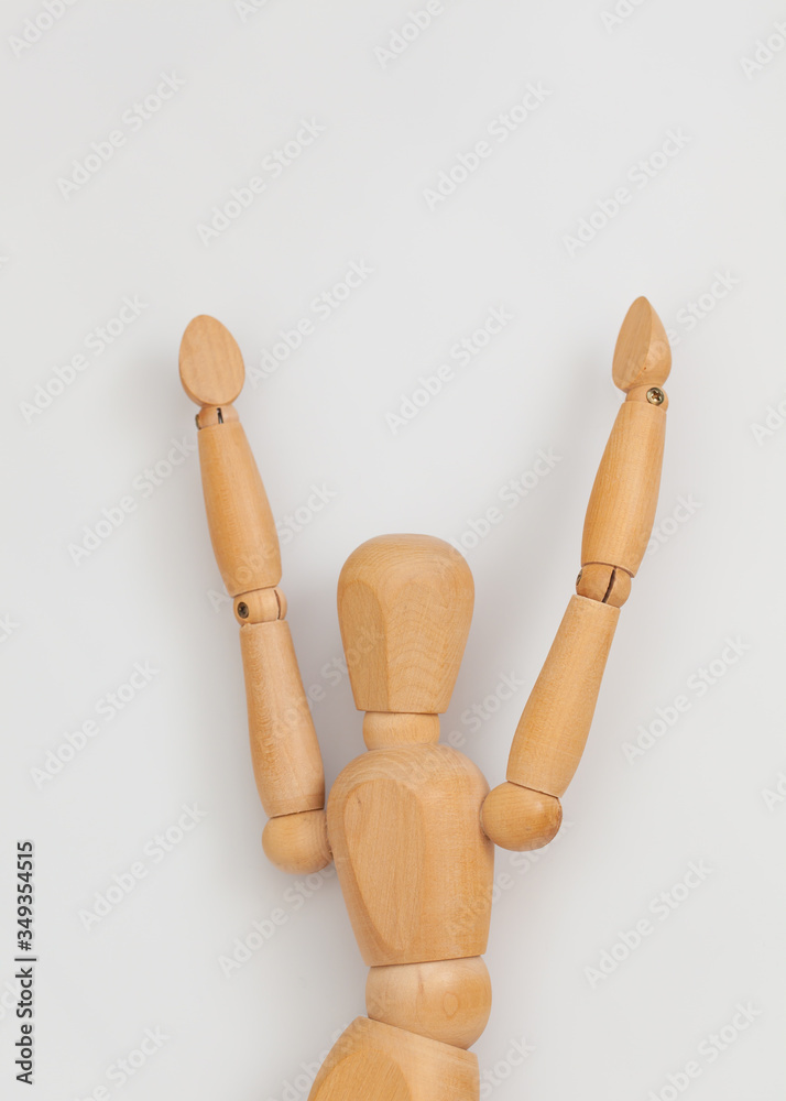 wooden mannequin raising both hands wooden mannequin raising both hands