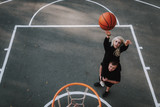 Young couple during sport game on basketball court