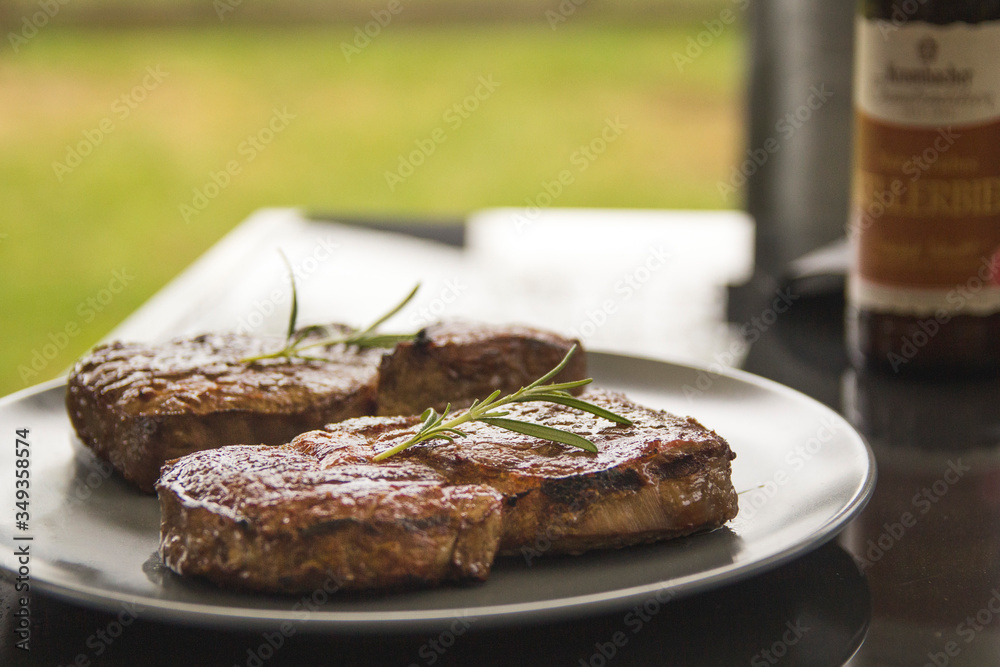 Delicious grilled beef served on table