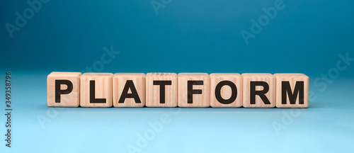 Platform - text concept on wooden cubes with gradient blue background
