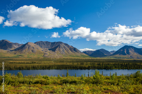 Alaskan mountain range near water © Lenspiration