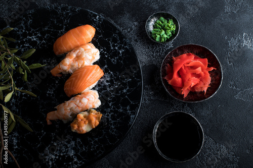 Close up of sashimi sushi set on black background