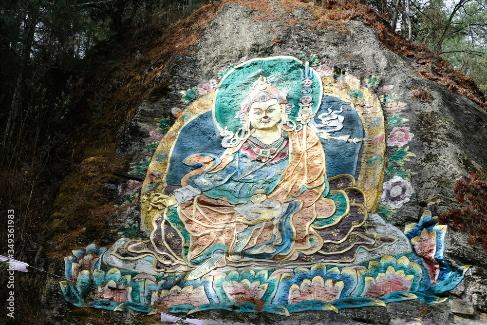 Guru Rinpoche, Buddhism painting on the rock in the high mountain of Bhutan